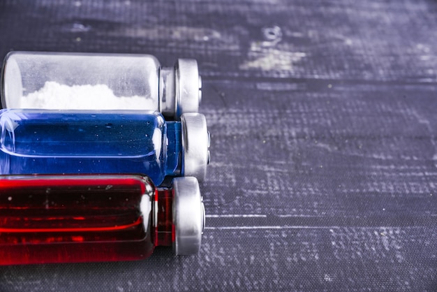 Three color white and red and blue medicine vial or ampoules