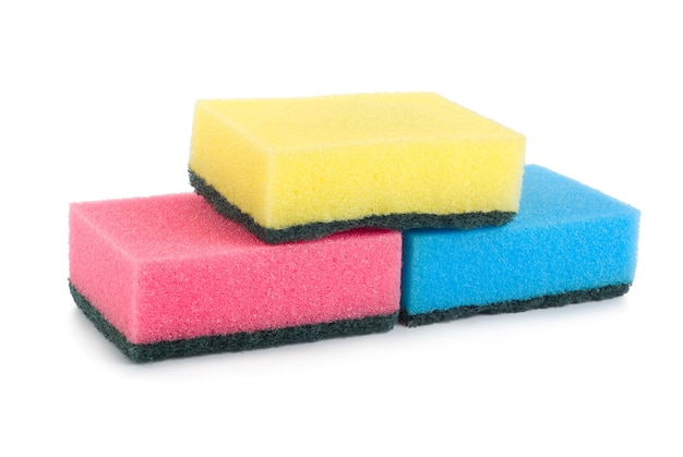 Three colored sponges isolated on white background