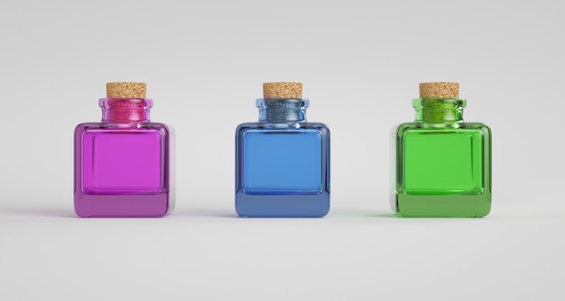 Three colorful glass jars with cork stopper.