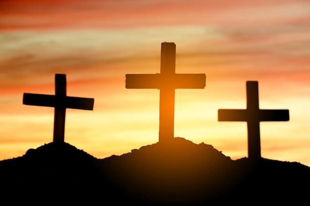 Three cross silhouette against the backdrop of a beautiful sunset