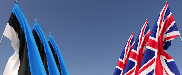 Three flags of the United Kingdom and Estonia on flagpoles on the sides Flags on a blue background Place for text Great Britain London England Tallinn Commonwealth 3D illustration