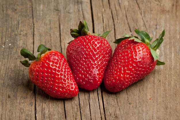 Three fresh strawberries