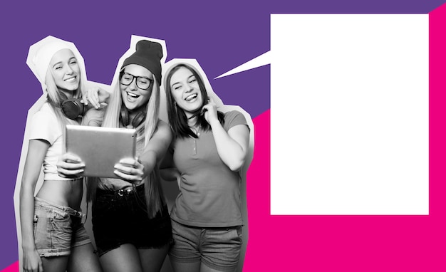 Three girls friends taking selfie with digital tablet