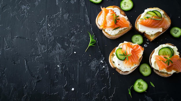 Three gourmet openfaced sandwiches with salmon cucumber and cream cheese on a dark table evoking a sense of culinary delight and elegance