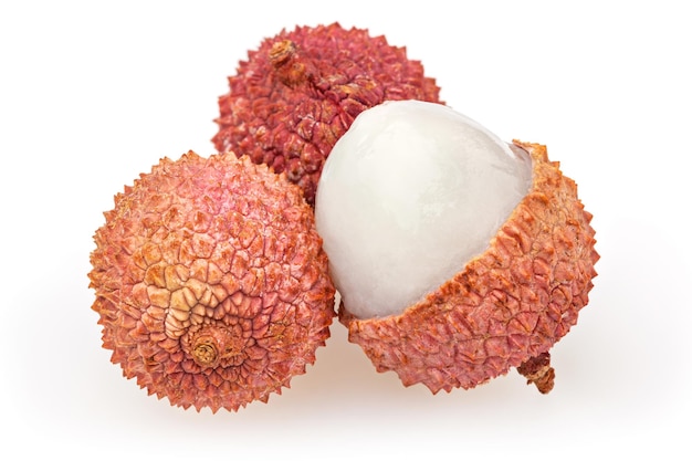 Three lychees isolated on white background