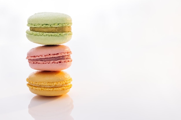 Three macarons against a bright white background sweet colorful macarons isolated on white backgroun