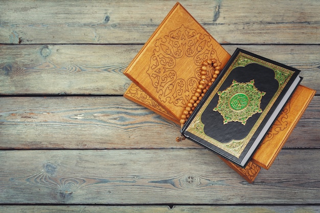 Three months, Islamic Holy Book Quran with rosary beads. 