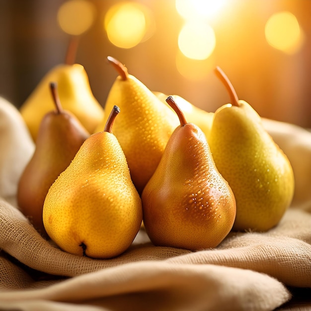 Photo three pears are on a towel with the light shining through