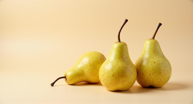 Photo three pears with one that has a stick of the stem