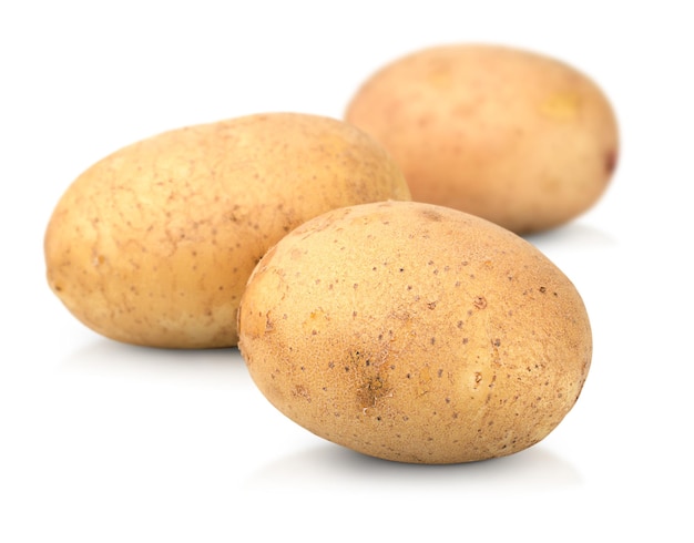 Three potatoes on a white isolated background