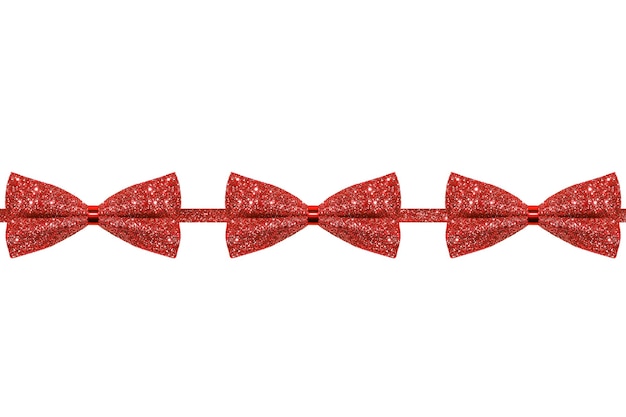 Three red shiny bows isolated on a white background And a red ribbon