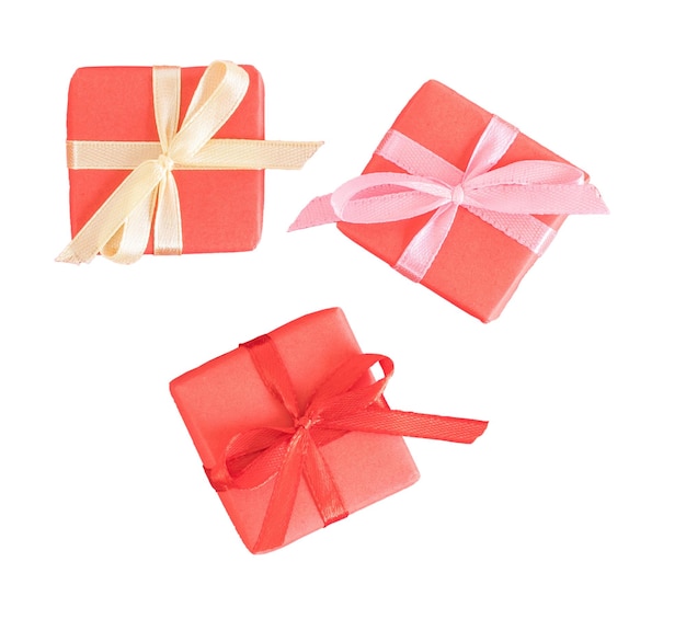 Three small red gift boxes top view isolated on white or transparent background