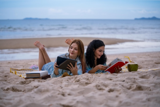 Three Women LGBT Relationship summer holiday on the beach.