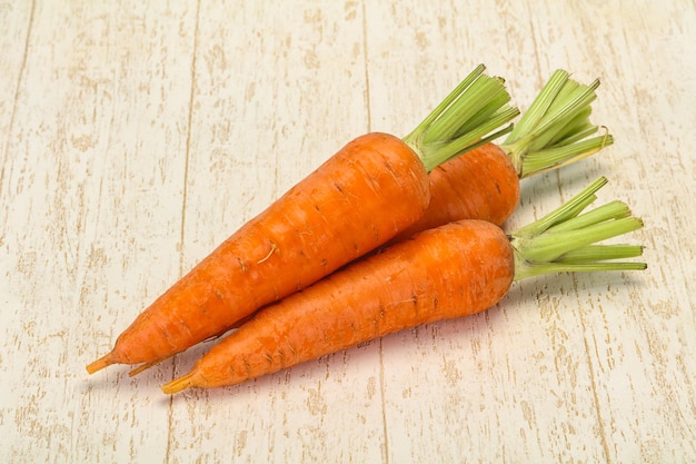 Three Young fresh ripe carrot