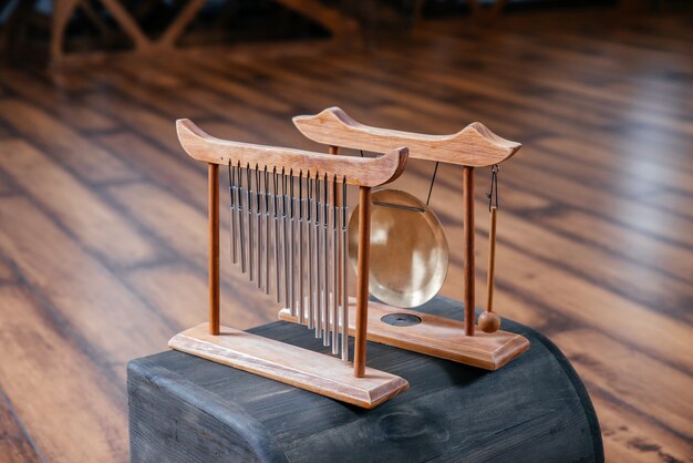 Tibetan sound instrument on the floor in yoga class sound therapy concept