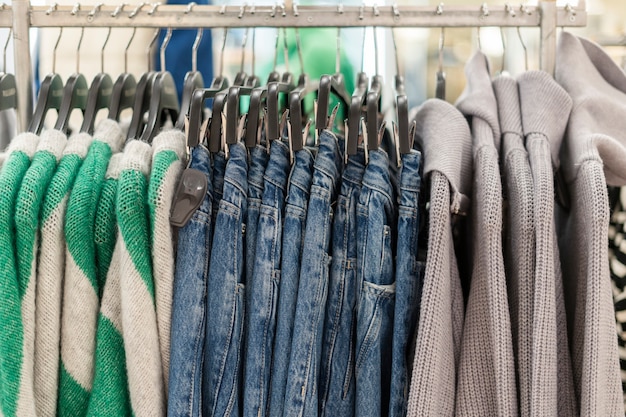 Tidy clothes on a rack in the shop