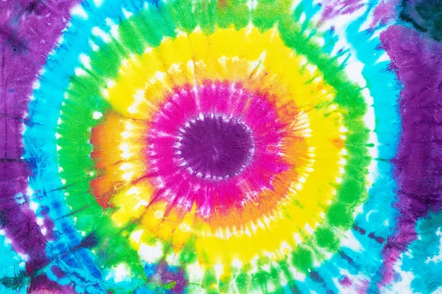 Tie dye pattern hand dyed on cotton fabric abstract background