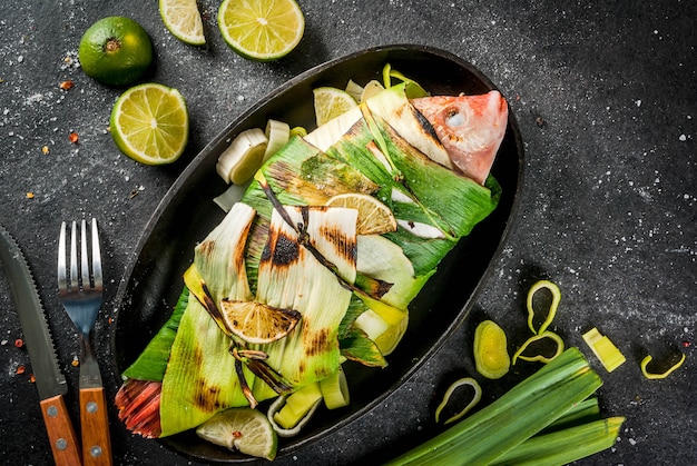 Tilapia roasted on grill in leeks