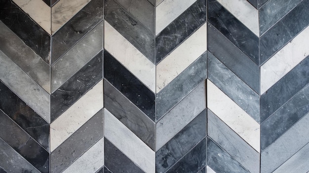 Photo a tile floor in a chevron pattern using alternating shades of grey for a contemporary design