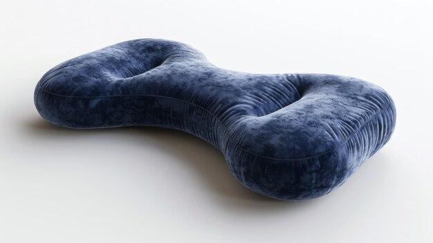 Tilted angle view of a sleek travel pillow luxurious memory foam rich navy blue fabric soft velvet texture photorealistic detail subtle lighting