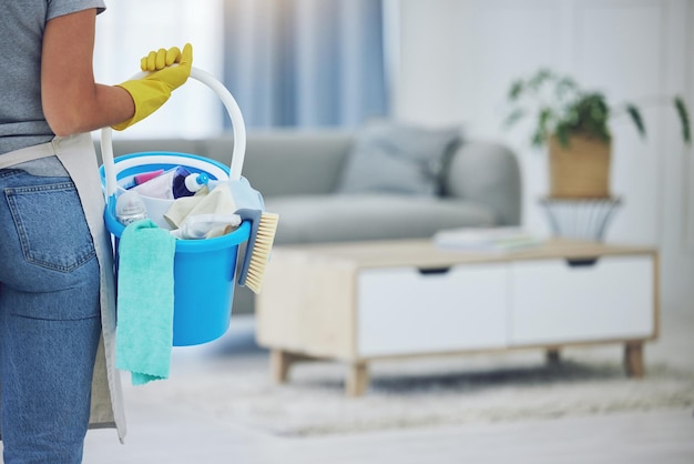 Time to clean this place. Shot of an unrecognizable person preparing to clean at home.