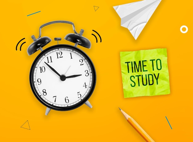 Time to study concept black alarm clock with pencil sticker paper airplane on yellow background