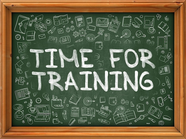 Time for Training Hand Drawn on Green Chalkboard