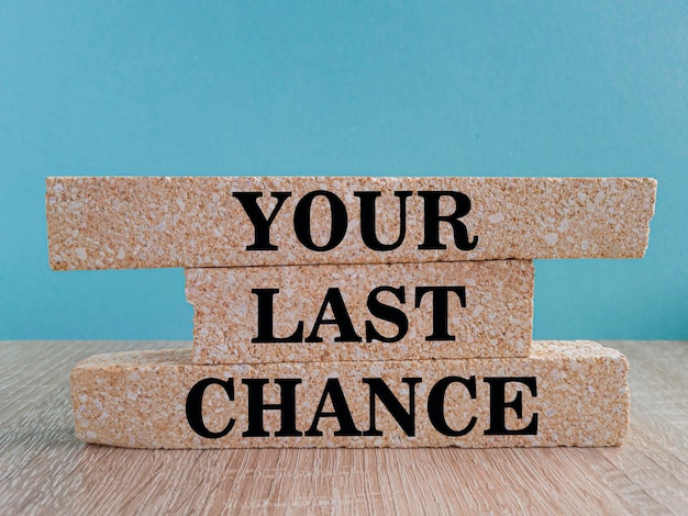 Time to your last chance symbol Concept words Your last chance on brick blocks