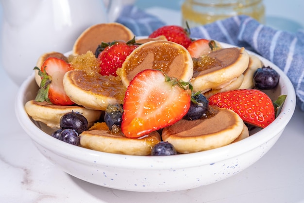 Tiny pancakes with strawberry