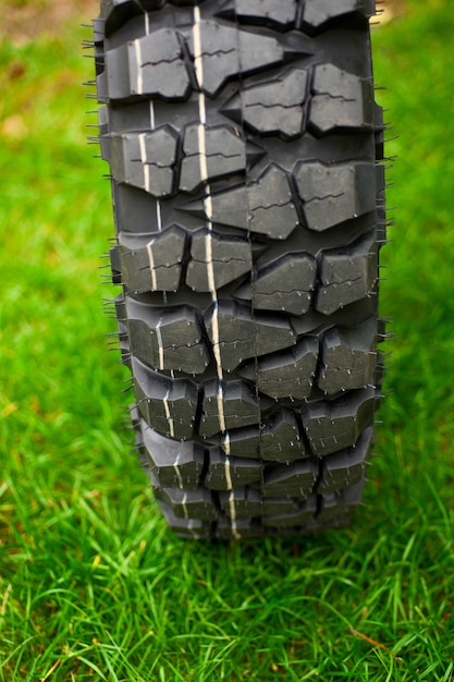 Tire at green grass