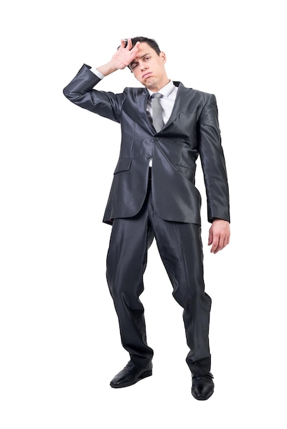 Tired man in light studio. White background.