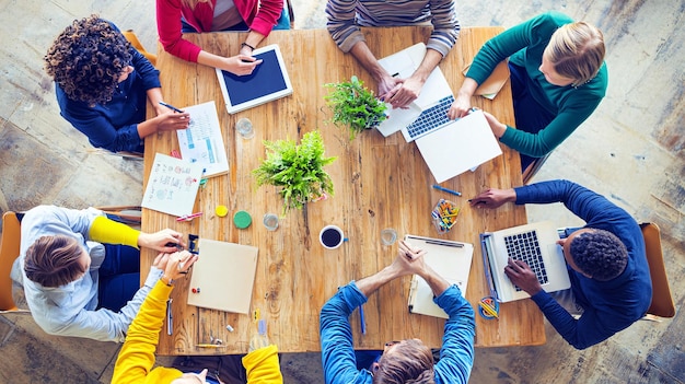 Photo title group of professionals collaborating in a creative workspace focused on innovation