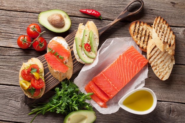 Toast sandwiches with avocado tomatoes salmon