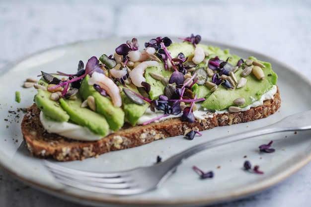 Toast with avocado on plate