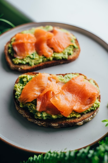 Toast with avocado and salmon