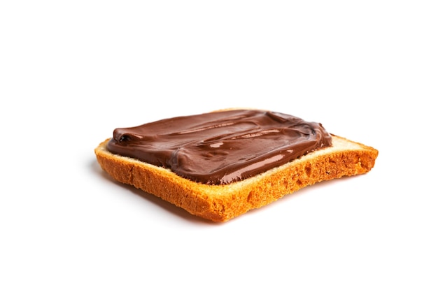 Toast with cocoa paste isolated on a white background. A piece of bread with chocolate paste. High quality photo