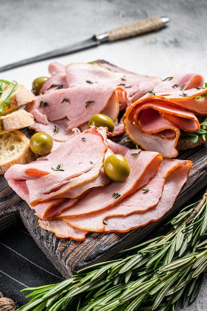 Toast with pork Ham and olives White background Top view Copy space