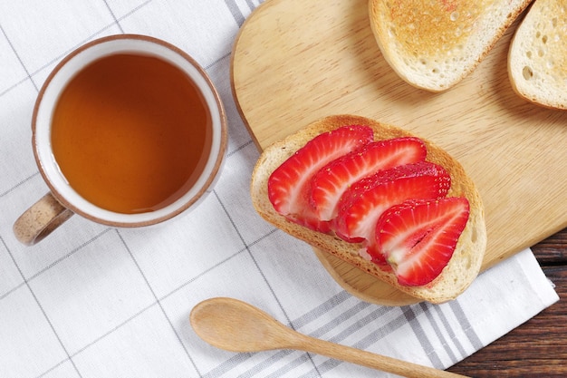 Toast with strawberry and tea