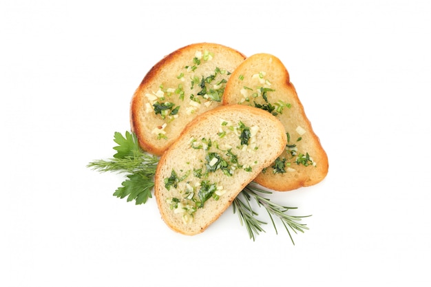 Toasted bread slices with garlic isolated on white