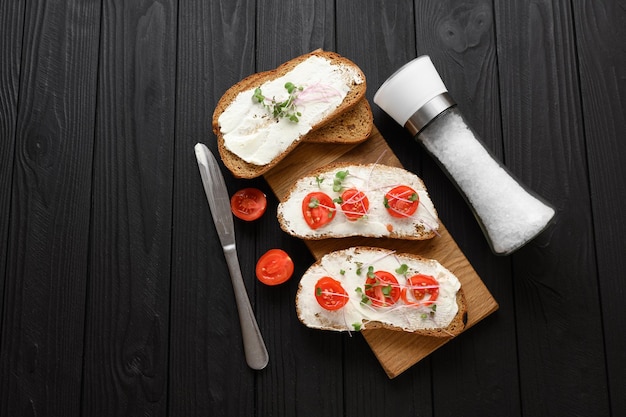 Toasts with microgreens on the table Healthy food vegan food and dieting concept