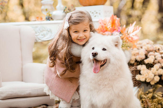 toddler girl in the autumn forest