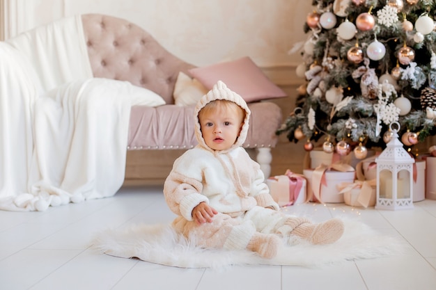 Toddler near the Christmas tree