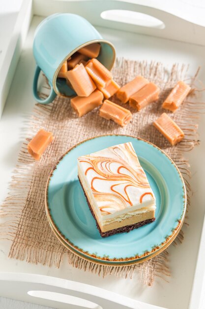 Toffee cake on blue porcelain and fudge bars