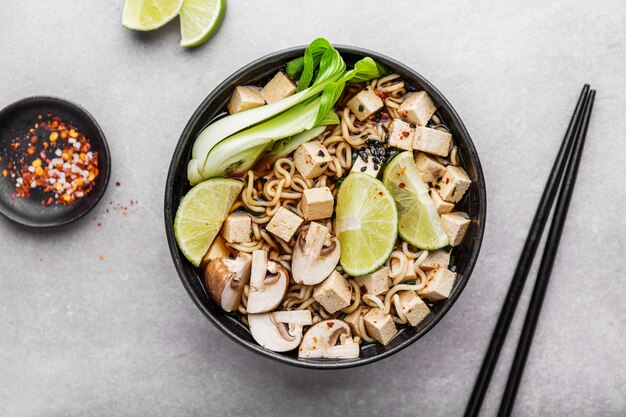 Tofu asian vegetarian soup served in bowl