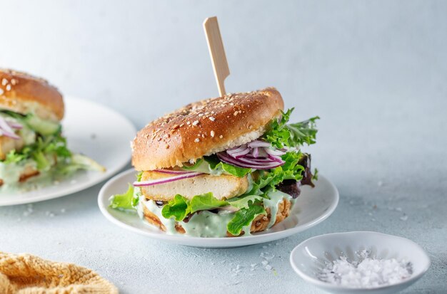 Tofu burger with vegetables on plate