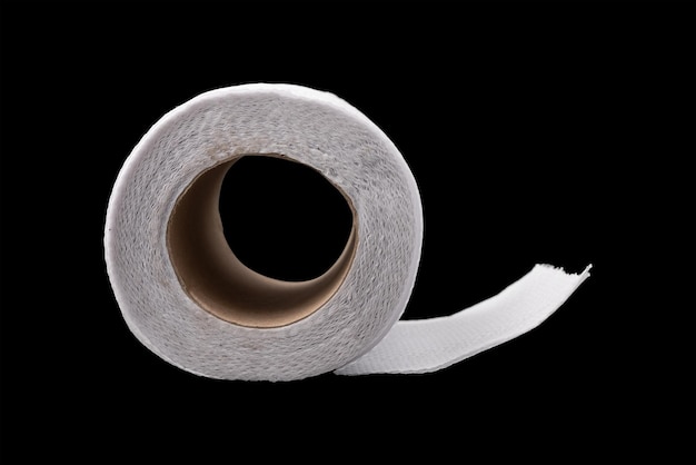 Toilet paper isolated on black