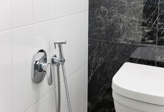 Toilet room interior loft style design in white and black color