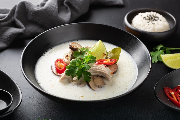 Tom kha gai on a black background selective focus