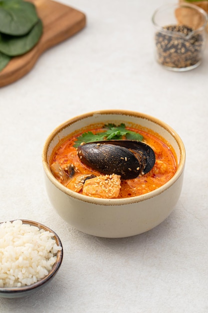 Tom yam seafood soup with rice