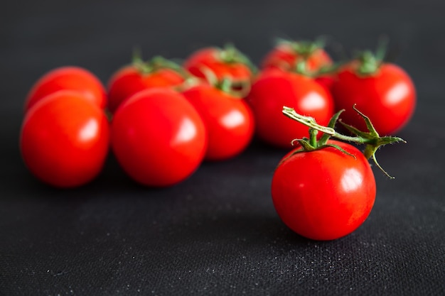 tomato cherry green branch vegetable fresh healthy meal food snack on the table copy space food